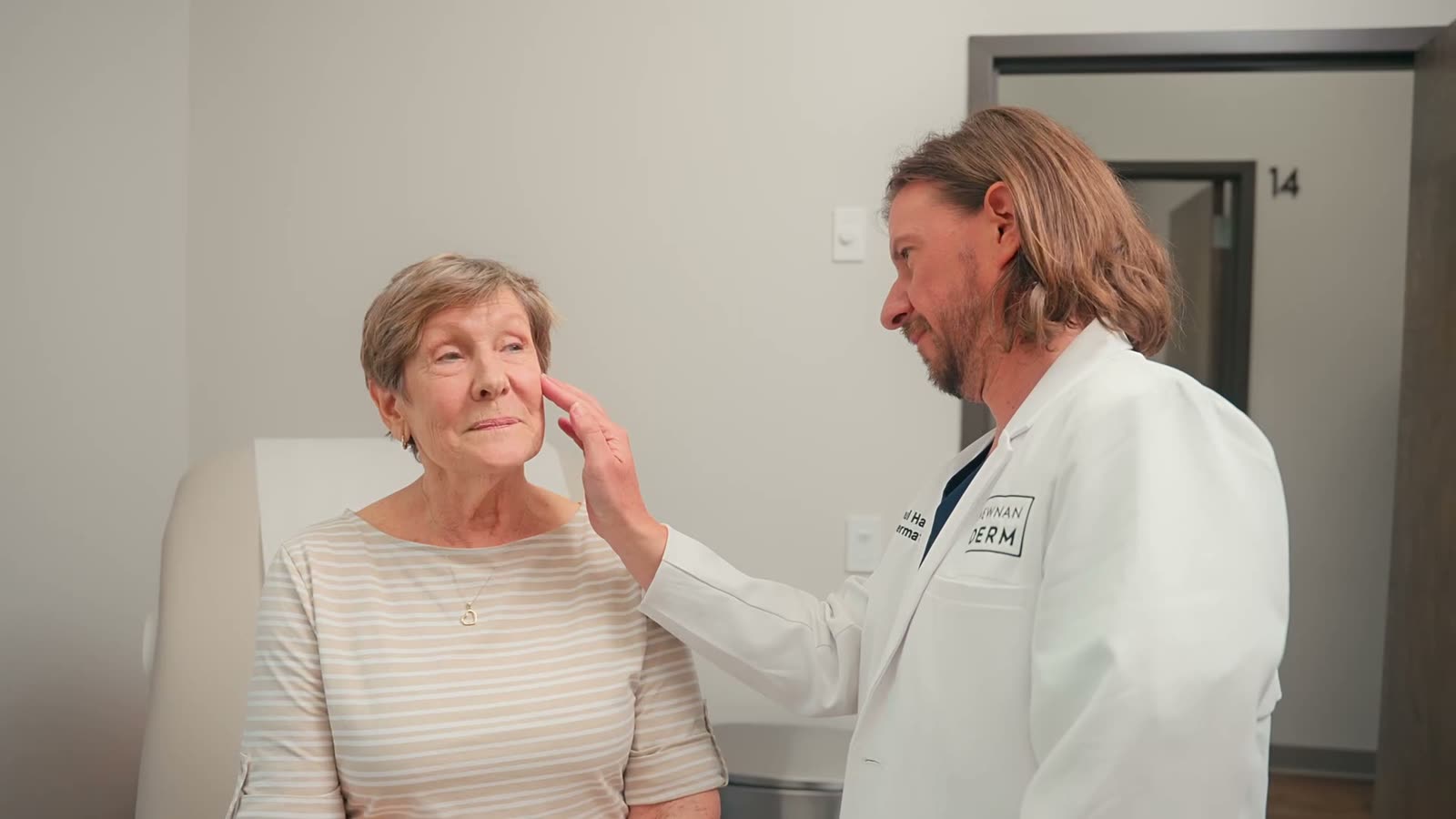 Dr. Paul Haun with a patient at Newnan Dermatology